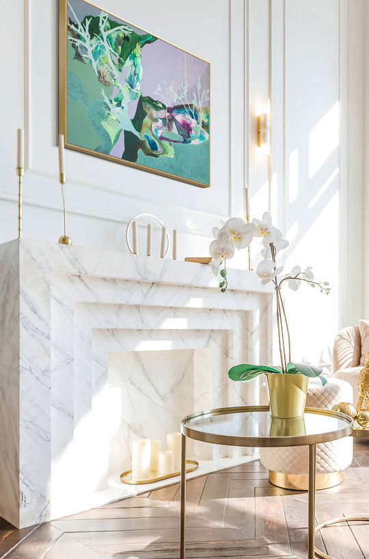 light green and lavender abstract landscape over modern marble fireplace